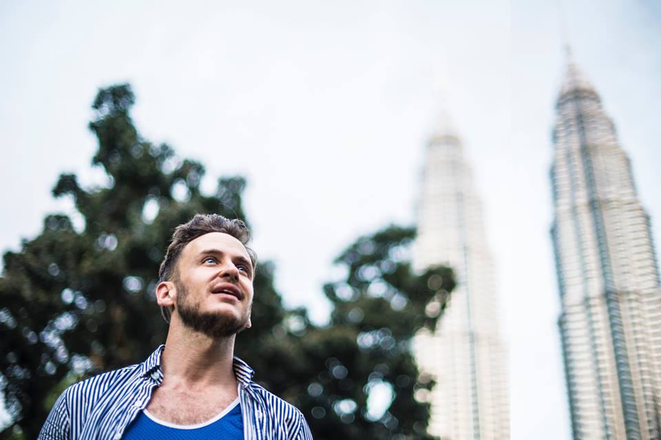 Robert at KLCC Park, Kuala Lumpur, Malaysia. Photo on the background is the Petronas Tower