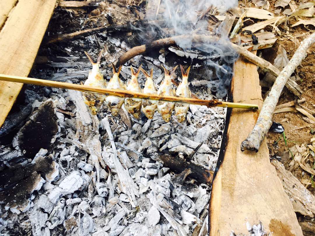 3a. locals smoking fish