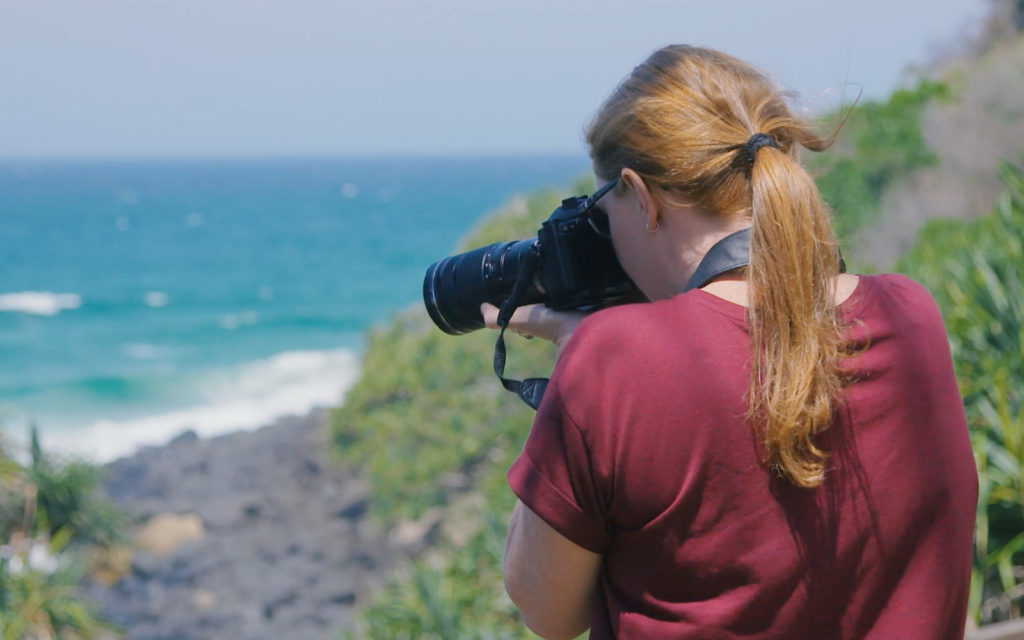 Lauren taking a photo (Credits: travelandleisure.com)